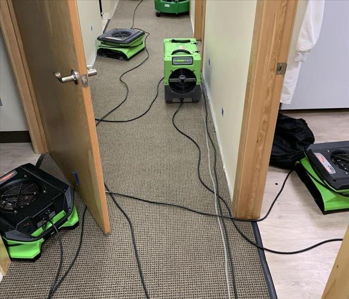 Air movers in an office building